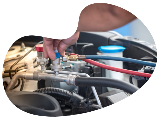 a man is working on a car's engine