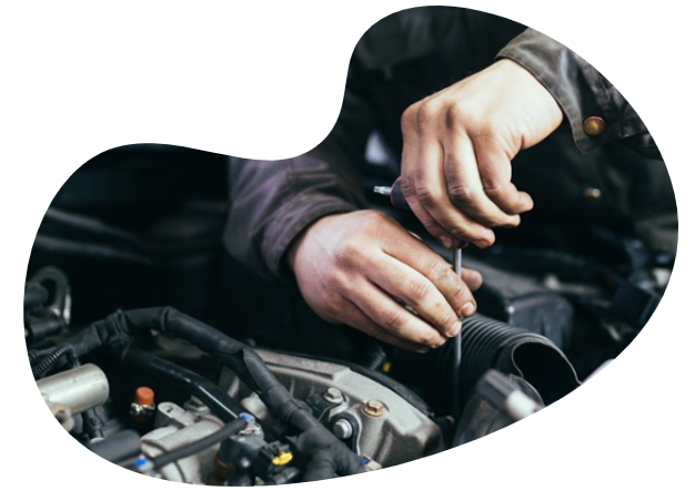 mechanic fixing a car engine