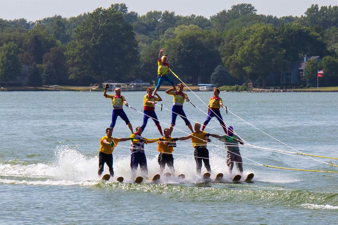 Team of Surfers in a Formation